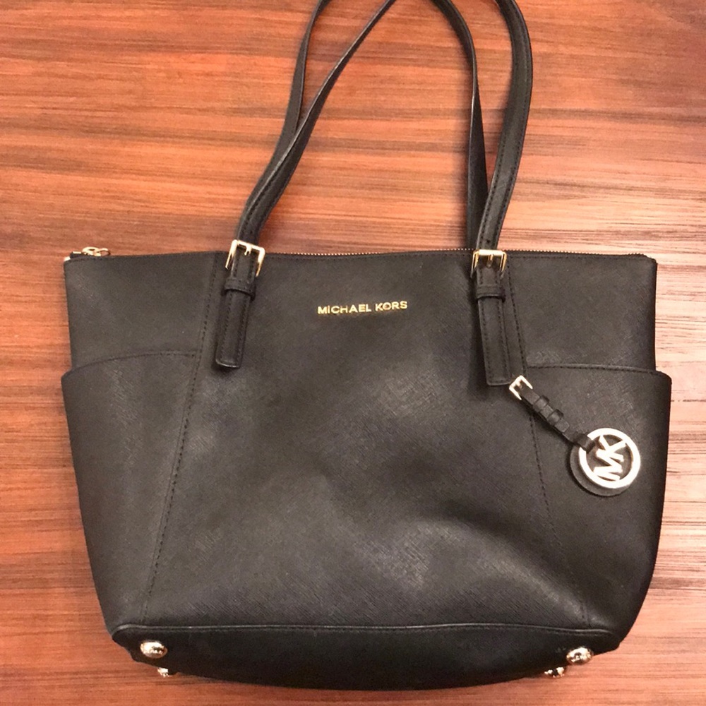 Michael Kors black and gold bag